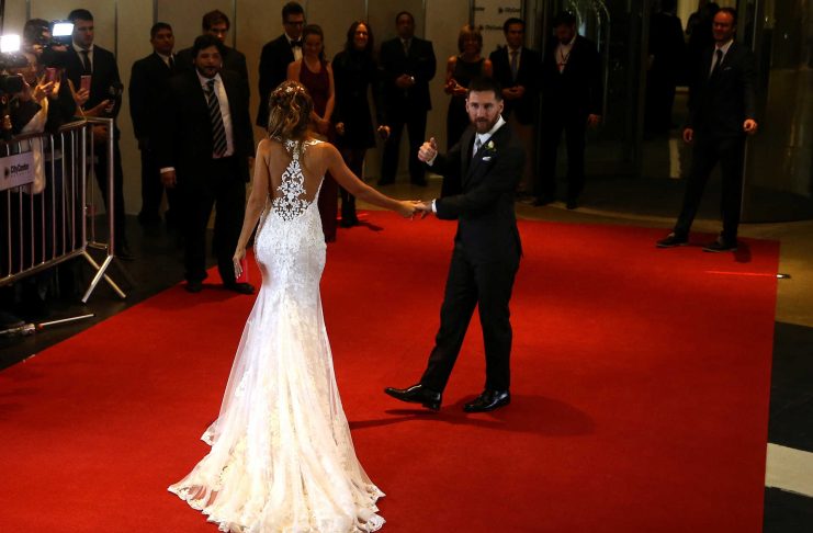 Argentine soccer player Lionel Messi and his wife Antonela Roccuzzo pose at their wedding in Rosario