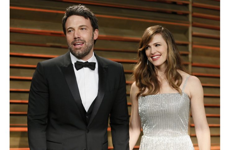 Actor Ben Affleck and his wife, actress Jennifer Garner arrive at the 2014 Vanity Fair Oscars Party in West Hollywood
