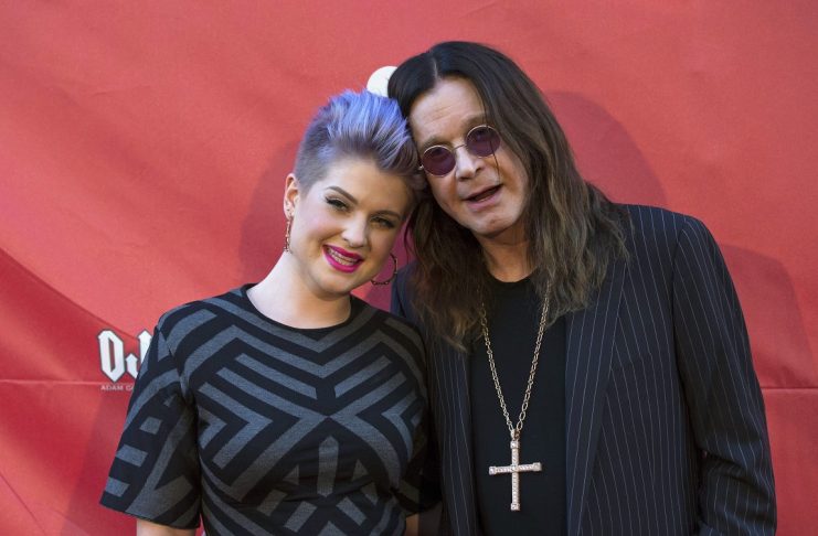Musician Osbourne and his daughter Kelly pose at the 10th Annual MusiCares MAP Fund Benefit concert at Club Nokia in Los Angeles