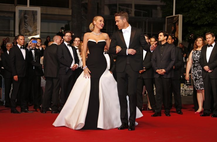 Cast member Ryan Reynolds and his wife actress Blake Lively pose on the red carpet as they arrive for the screening of the film “Captives” in competition at the 67th Cannes Film Festival in Cannes