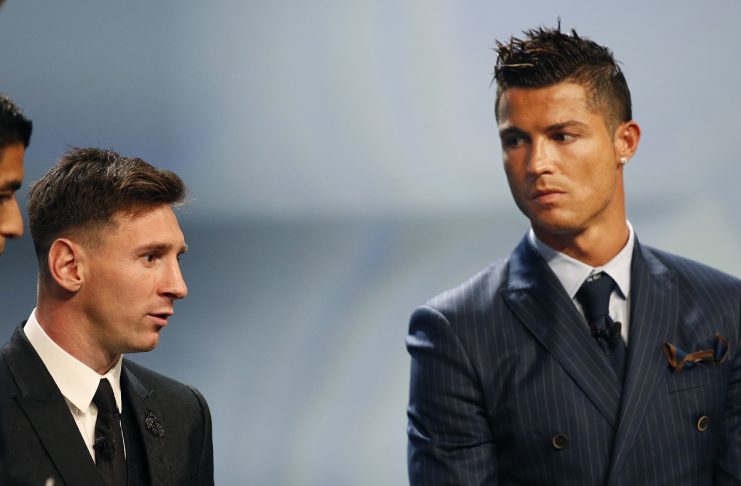 Barcelona’s Lionel Messi looks at Cristiano Ronaldo during he Best Player UEFA 2015 Award ceremony during the draw ceremony for the 2015/2016 Champions League Cup soccer competition at Monaco’s Grimaldi Forum in Monte Carlo