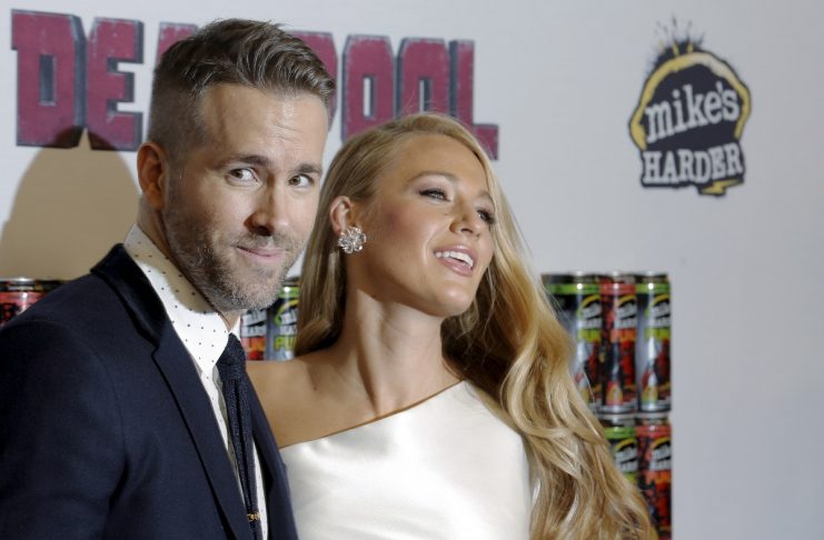 Actor Ryan Reynolds poses with his wife actress Blake Lively at the premiere of “Deadpool” in New York