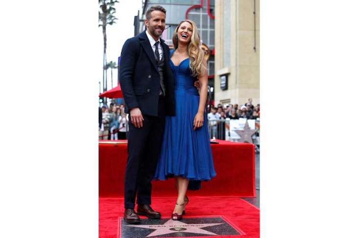 Actor Reynolds poses with his wife Lively after unveiling his star on the Hollywood Walk of Fame in Hollywood