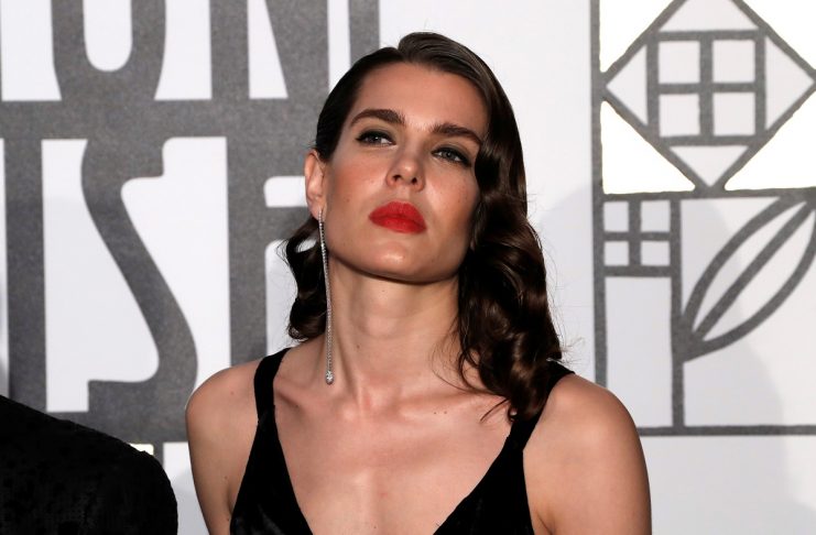 Charlotte Casiraghi poses as she arrives at the Monte Carlo Sporting for the Bal de la Rose in Monte Carlo