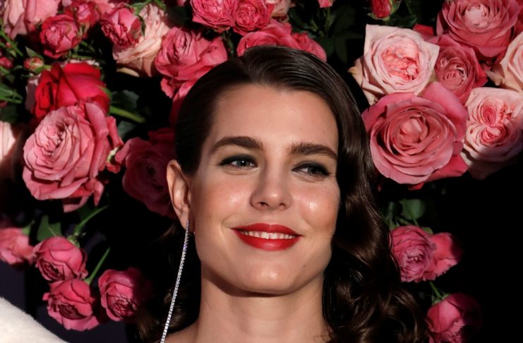 Charlotte Casiraghi poses as she arrives at the Monte Carlo Sporting for the Bal de la Rose in Monte Carlo