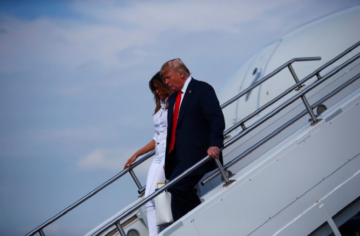 U.S. President Donald Trump and First Lady Melania Trump disembark Air Force One in Morristown