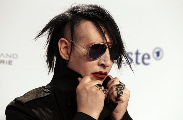 Singer Manson arrives on the red carpet for the Echo Music Awards ceremony in Berlin