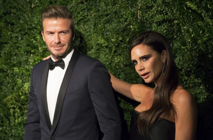 Former British soccer player David Beckham and his wife Victoria attend the Evening Standard Theatre Awards in London