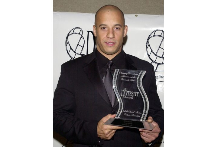 ACTOR VIN DIESEL POSES WITH AWARD AT DIVERSITY AWARDS IN LOS ANGELES.