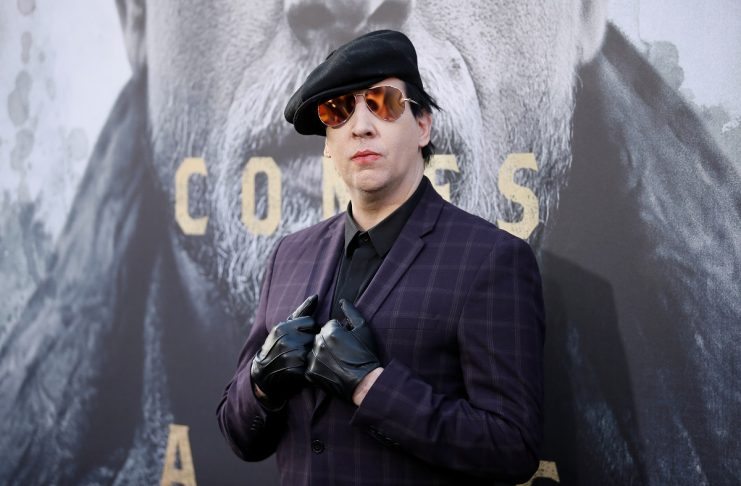 Musician Marilyn Manson poses at the premiere of “King Arthur: Legend of the Sword” at the TCL Chinese Theatre IMAX, in Hollywood, California
