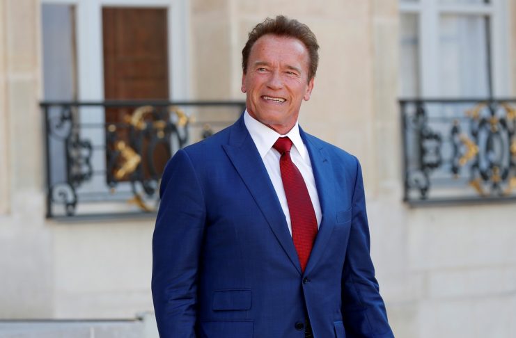 Former California Governor Arnold Schwarzenegger leaves the Elysee Palace in Paris, France
