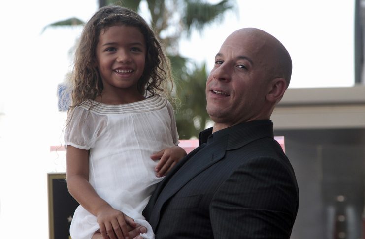 Actor Vin Diesel poses with his daughter Hania Riley during a ceremony to unveil his star on the Hollywood Walk of Fame in Hollywood, California