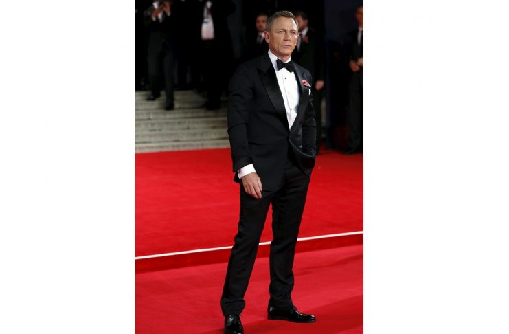 Daniel Craig poses for photographers as he attends the world premiere of the new James Bond 007 film “Spectre” at the Royal Albert Hall in London