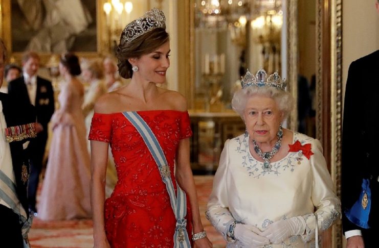 Britain’s Queen Elizabeth II and Spain’s Queen Letizia pose for a group photograph beside their husbands before a State Banquet at Buckingham Palace in London