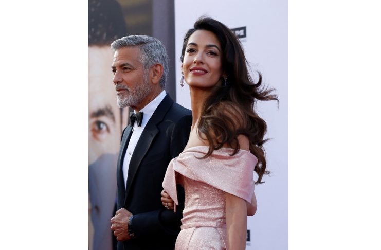 Actor Clooney and his wife Amal pose at the 46th AFI Life Achievement Award Gala in Los Angeles