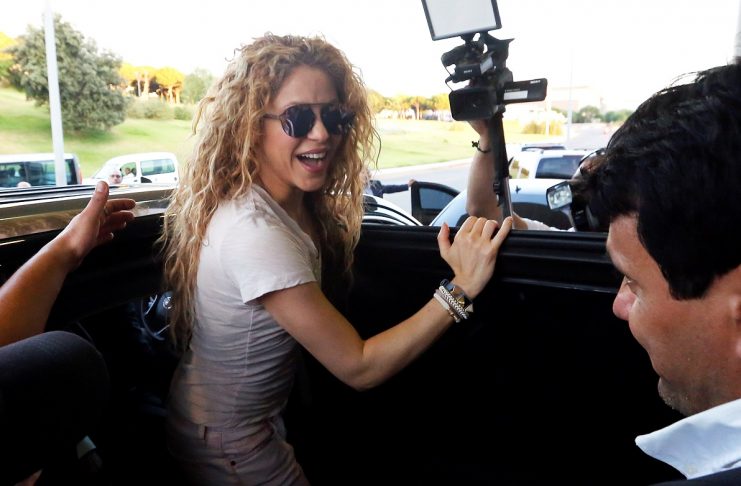 Colombian singer Shakira reacts upon her arrival with her kids at the airport in Beirut