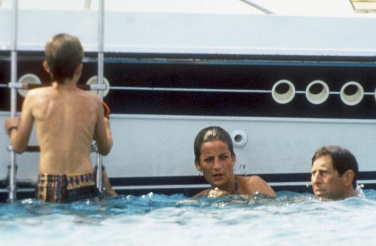 Princess Diana and Prince Charles swim in the Tyrrenian Sea of the coast of Sardinia