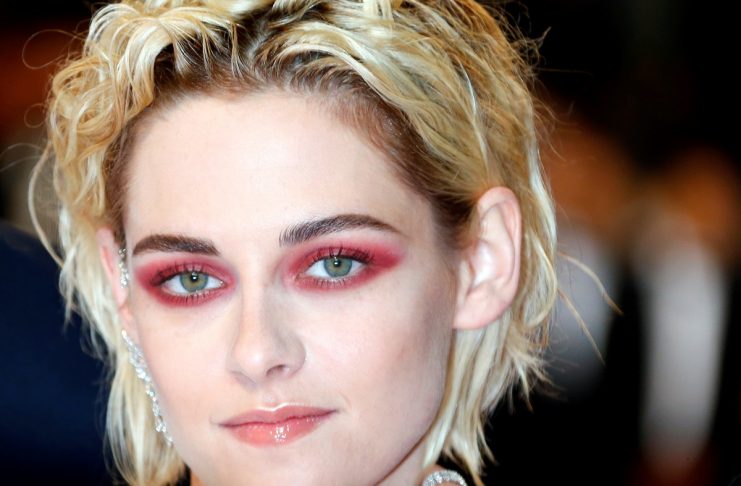 Cast member Kristen Stewart poses on the red carpet before the screening for the film “Personal Shopper” in competition at the 69th Cannes Film Festival in Cannes