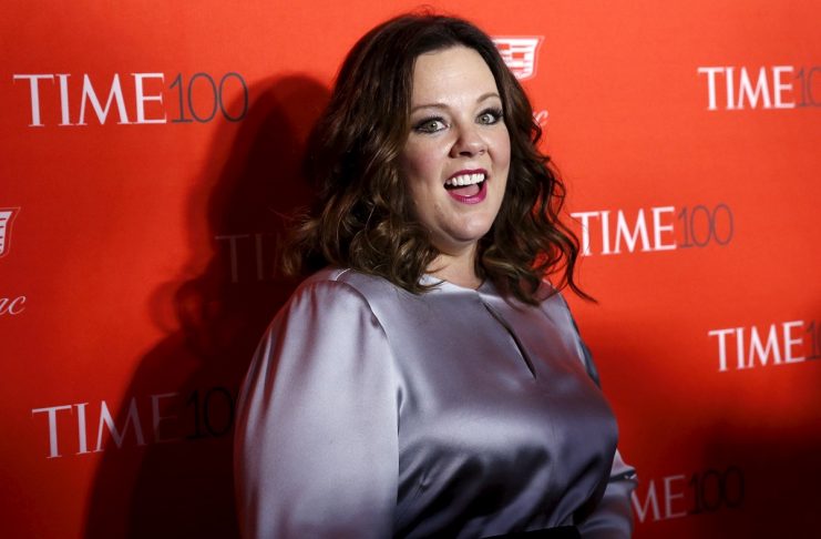 Actress Melissa McCarthy poses for photographers on the red carpet as she arrives for the TIME 100 Gala in Manhattan, New York