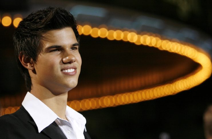 Taylor Lautner poses at the premiere of the movie Twilight at the Mann Village and Bruin theatres in Westwood