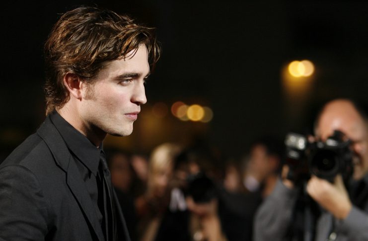 Robert Pattinson poses at the premiere of the movie Twilight at the Mann Village and Bruin theatres in Westwood