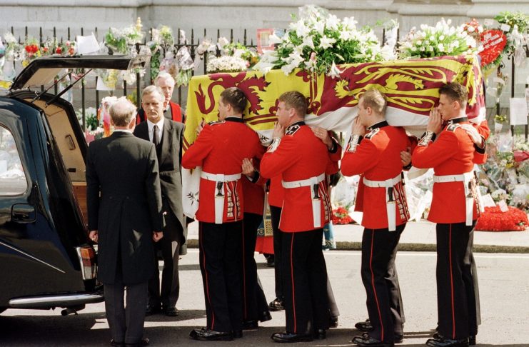 The coffin of Diana, Princess of Wales, is placed into a hearse following a funeral service at Westm..