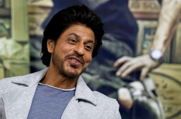 Bollywood actor Shah Rukh Khan speaks during an interview with Reuters in Mumbai
