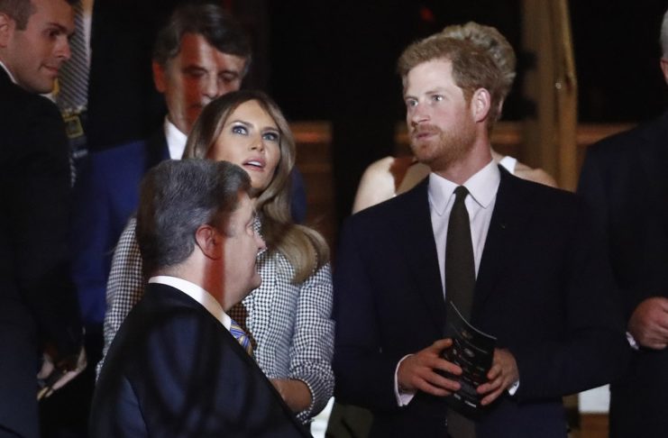U.S. first lady Trump and Britain’s Prince Harry chat during the opening ceremony for the Invictus Games in Toronto