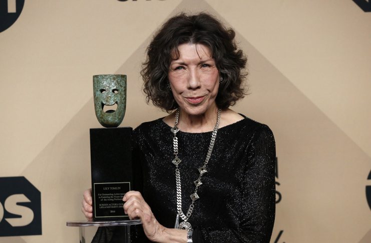 Actress Lily Tomlin poses with her Lifetime Achievement Award backstage at the 23rd Screen Actors Guild Awards in Los Angeles