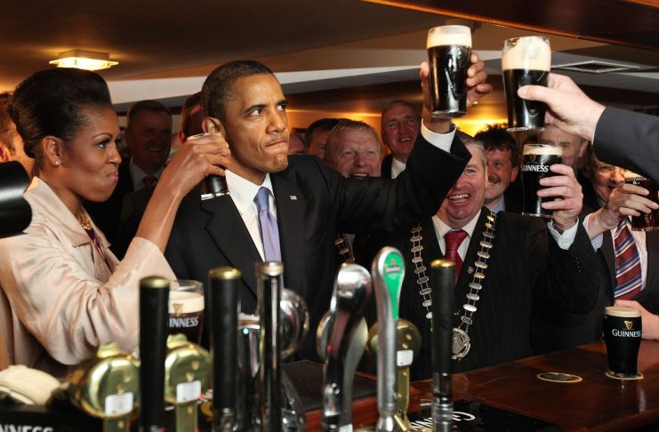 U.S. President Barack Obama toasts with first lady Michelle Obama in Ollie Hayes Pub in Obama’s ancestral home in Moneygall