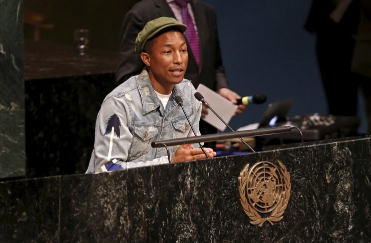 Pharrell Williams addresses youth gathered in the United Nations General Assembly hall on International Day of Happiness at U.N. headquarters in New York