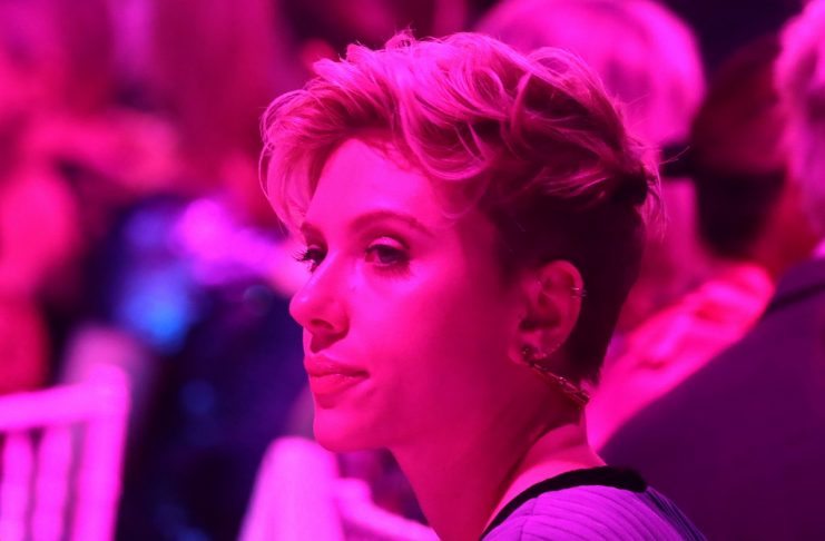 Actress Scarlett Johansson sits during the Planned Parenthood 100 Years Gala in New York