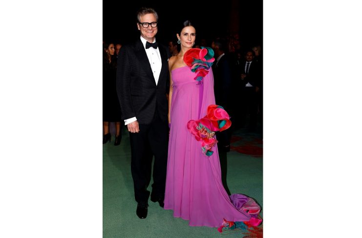 Actor Colin Firth and his wife Livia pose as they arrives at the “Green carpet Fashion Awards” event during the Milan Fashion Week in Milan