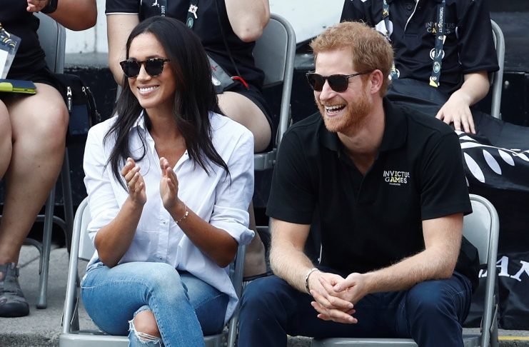 Britain’s Prince Harry and his girlfriend actress Markle watch the wheelchair tennis event during the Invictus Games in Toronto