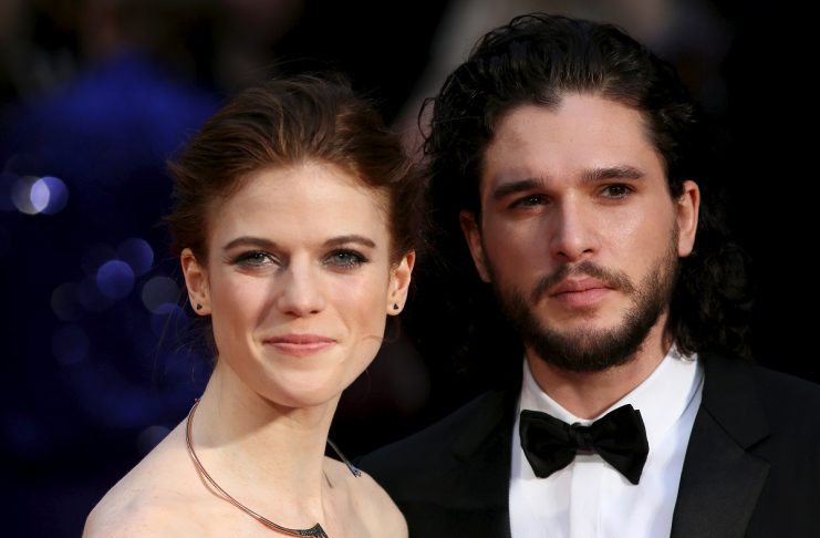 Actor Kit Harington and actress Rose Leslie pose for photographers as they arrive at the Olivier Awards at the Royal Opera House in London