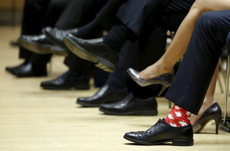 Canada’s PM Trudeau wears maple leaf-themed socks during the First Ministers’ meeting in Ottawa