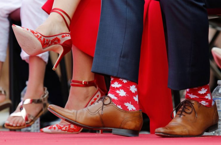 Canada’s PM Trudeau wears maple leaf-themed socks during Canada Day celebrations on Parliament Hill in Ottawa