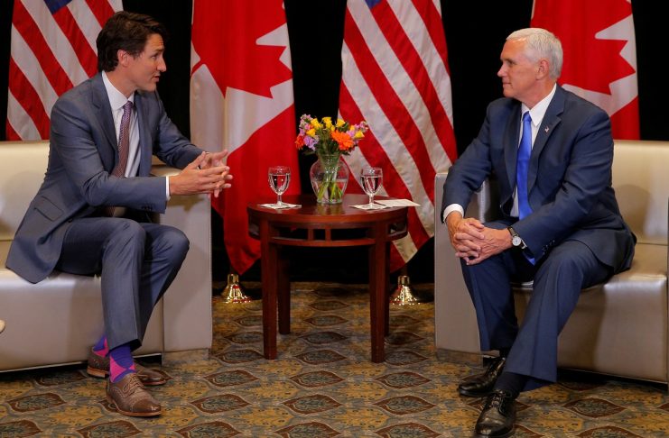 Canadian Prime Minister Trudeau and United States Vice President Pence meet at the National Governors Association summer meeting in Providence