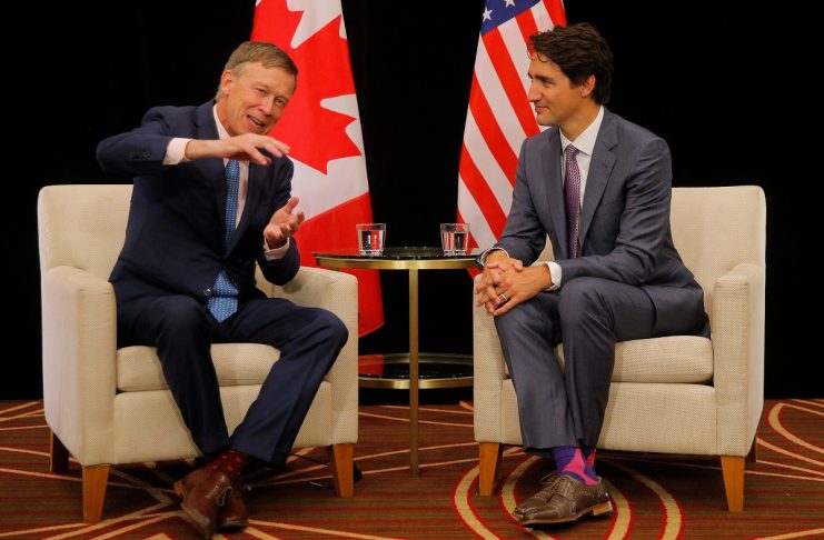 Canadian Prime Minister Trudeau meets Colorado Governor Hickenlooper at the National Governors Association summer meeting in Providence
