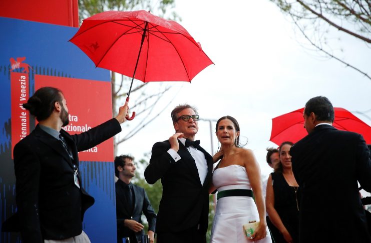 Actor Colin Firth and his wife Livia Giuggioli arrive for the Franca Sozzani Award ceremony at the 74th Venice Film Festival in Venice