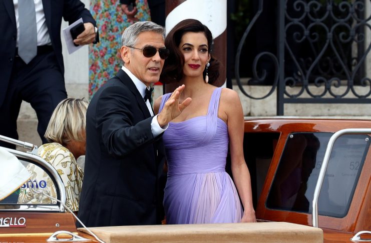 Actor and director Clooney and his wife Amal leaves the hotel before the red carpet for the movie Suburbicon at the 74th Venice Film Festival in Venice