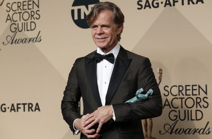 Actor William H. Macy holds the award he won for Outstanding Performance by a Male Actor in a Comedy Series for his role in “Shameless” at the 23rd Screen Actors Guild Awards in Los Angeles