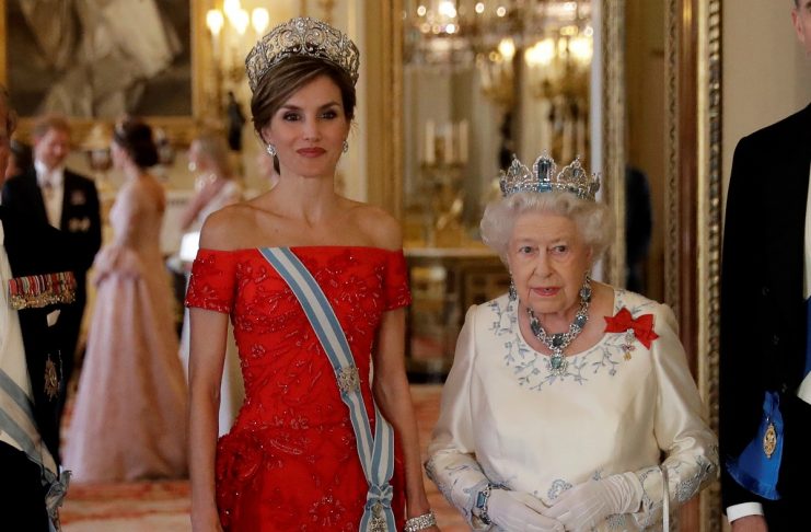 Britain’s Queen Elizabeth II and Spain’s Queen Letizia pose for a group photograph beside their husbands before a State Banquet at Buckingham Palace in London,
