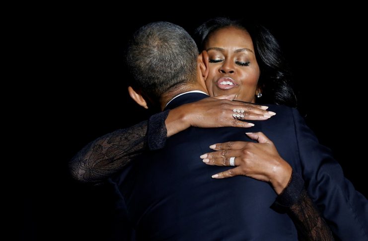Obama embraces his wife Michelle Obama after his farewell address in Chicago
