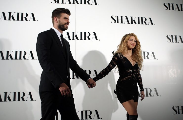 Colombian singer Shakira and FC Barcelona’s soccer player Gerard Pique pose during a photocall presenting her new album “Shakira” in Barcelona