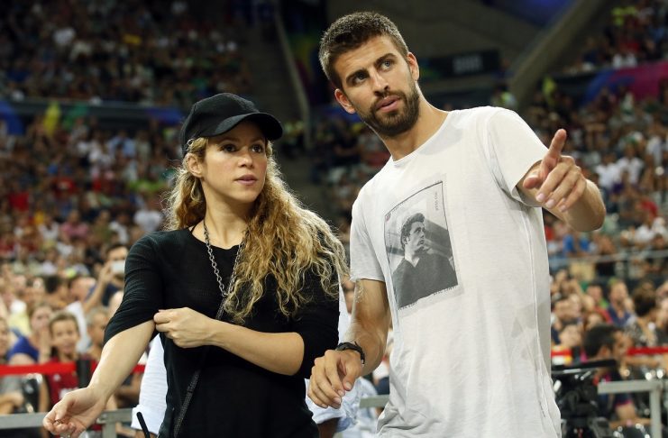 Colombian singer Shakira and her partner, Barcelona soccer player Pique, attend the Basketball World Cup quarter-final game between the U.S. and Slovenia in Barcelona