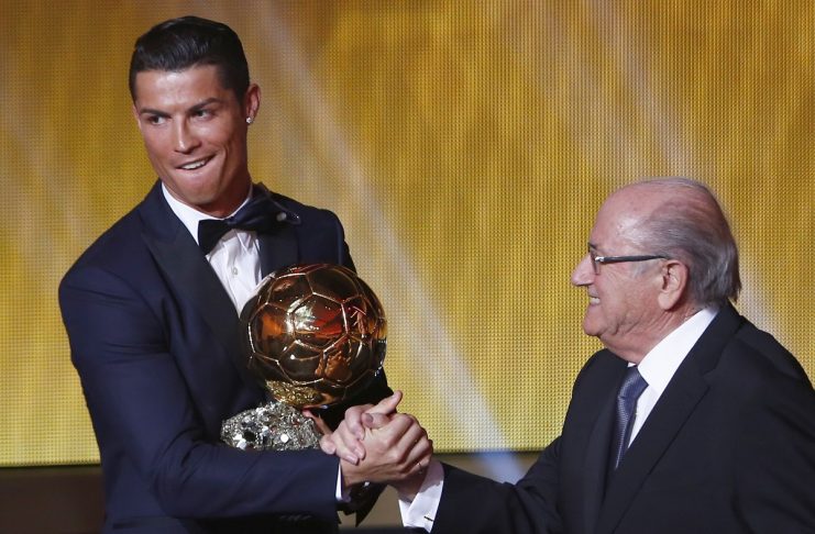 Real Madrid’s Ronaldo  is congratulated by FIFA President Blatter after winning FIFA Ballon d’Or 2014 in Zurich