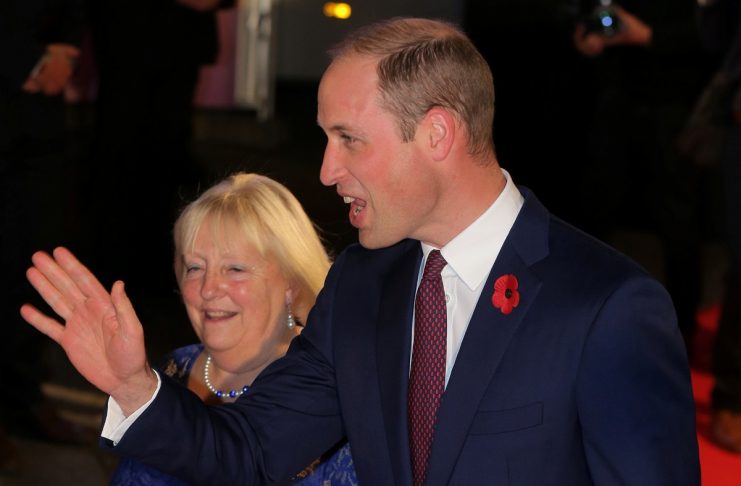 Britain’s Prince William waves as he arrives for the Pride of Britain Awards in London