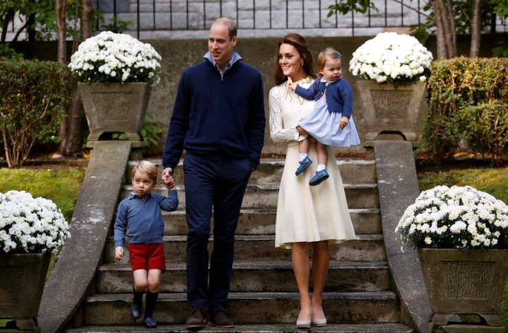 Britain’s Prince William, Catherine, Duchess of Cambridge, Prince George and Princess Charlotte arrive at a children’s party at Government House in Victoria