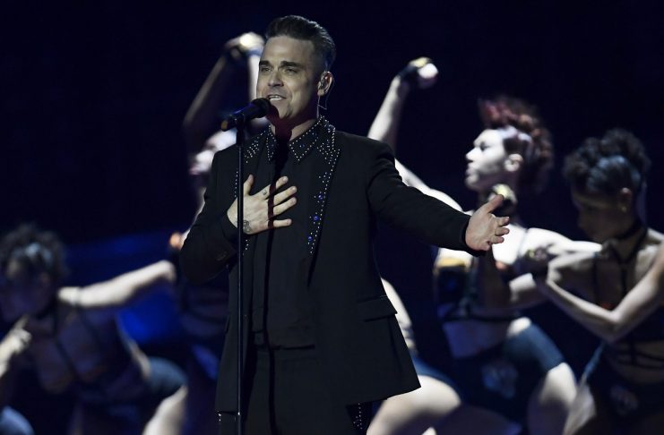 Robbie Williams performs at the Brit Awards at the O2 Arena in London